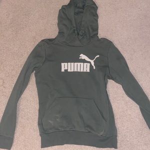Green Puma sweatshirt.